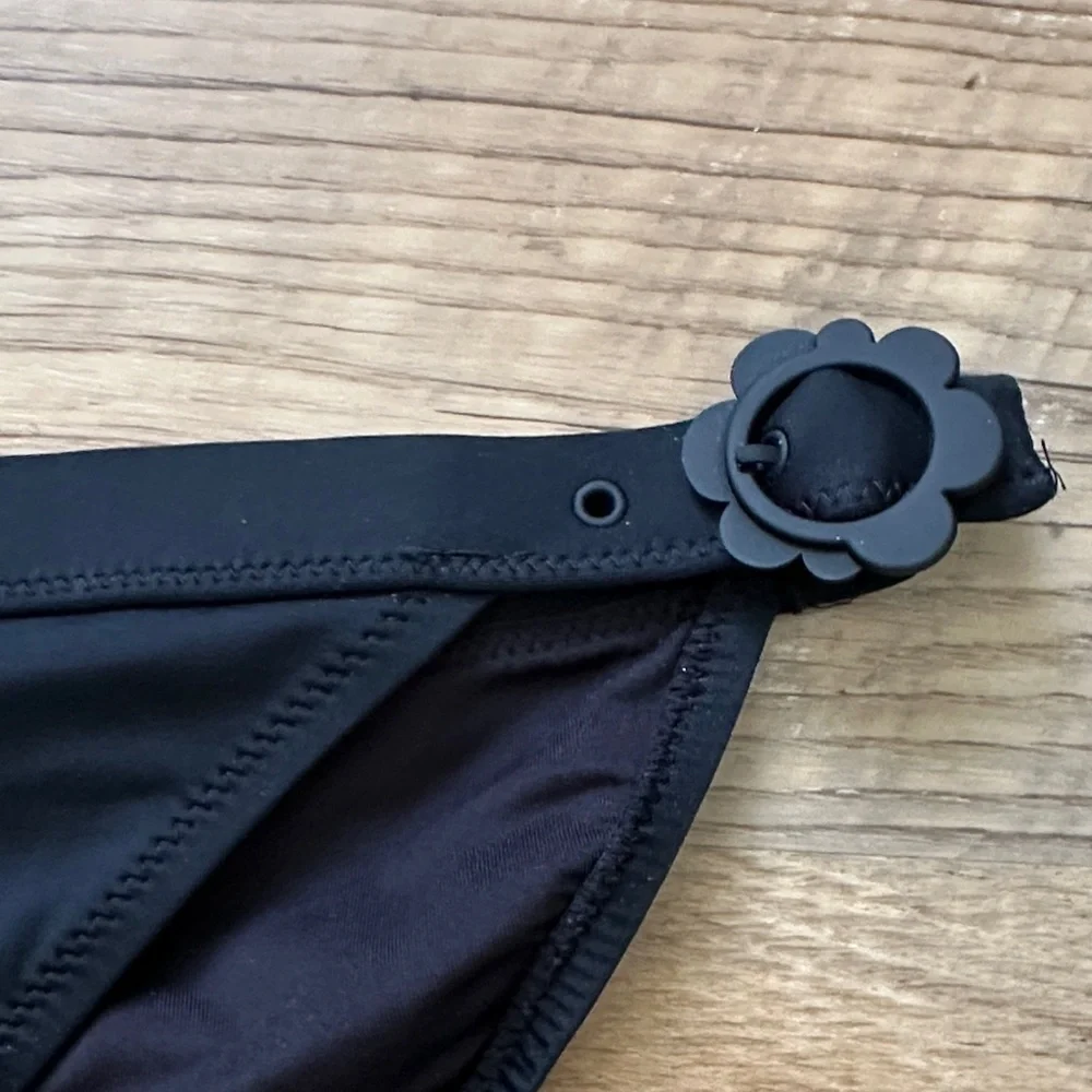 Kate Spade Black Bikini Bottom with Floral Accents. In great condition.